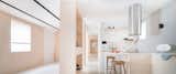 Kitchen, Cooktops, Laminate Counter, Porcelain Tile Floor, Wood Cabinet, Wall Lighting, and Ceiling Lighting  Photo 19 of 23 in BEYOME Lavapiés by Enorme Studio