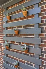 Outdoor, Horizontal Fences, Wall, Raised Planters, and Back Yard  Photo 14 of 14 in The Ranch Revival by Savannah Gordon