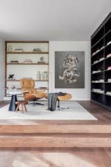 Living Room, Console Tables, Coffee Tables, Dark Hardwood Floor, Bookcase, and Floor Lighting  Photo 5 of 17 in CG House Madrid by Lourdes Martínez Nieto Arquitectura y Diseño