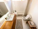 the bathroom with custom-made vanity and soaking tub