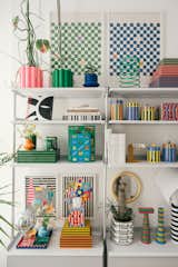 The madcap stripes in Mikei’s workspace were all inspired by the black-and-white Ettore Sottsass coffee table book seen in the upper left-hand shelf.