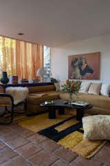 A self-portrait of a lady with a dog (found at Salvare Goods) ties together the color palette of the living area. A bunch of people tried to talk him out of buying it, but he was convinced. "<span style="font-family: Theinhardt, -apple-system, BlinkMacSystemFont, "Segoe UI", Roboto, Oxygen-Sans, Ubuntu, Cantarell, "Helvetica Neue", sans-serif;">I was like, 'No, this is the vision for the whole apartment,