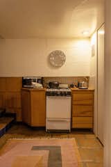 The kitchen didn’t need much except some decor. "It had a beautiful built-in and felt like a kitchen on a boat, especially because you had to step down to get into it," Thomas says.