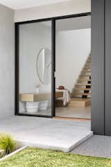 We have many pieces of paper where we drew up our concept for our floating entrance seat. We wanted to provide a practical spot to sit down and take off your shoes. We also added an LED strip under the seat which looks really effective at night.