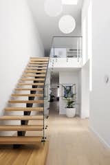 We wanted to make a statement from the very start - and highlight the light and space in the home. The void, skylights and extra wide entrance really achieve this! The pendants (the same in both homes) took almost all day to hang - ensuring the exact placement and level of each was perfect as per our vision!
