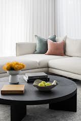 Behind the sheers are motorised roller blinds. It makes opening and closing the blinds each day so easy with the click of a button!  