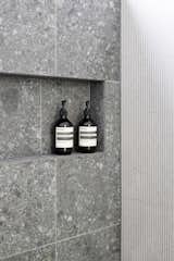 Visitors can't help but reach out to feel the textured 'Stark Lining' tiles in our bathrooms from Signorino.