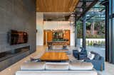 Large terraces, kitchen, dining and living spaces are contained on the main floor, which is considerably smaller than the upper level or basement. 
