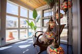 Windows and Picture Window Type Moroccan Leather Recliner and lamp in lower level sunroom  Photo 8 of 16 in Alpine Haven, Twin Lakes, Colorado. by Bert Rankin