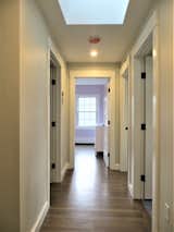 Hallway and Medium Hardwood Floor  Photo 4 of 5 in The CP House by christine arthur