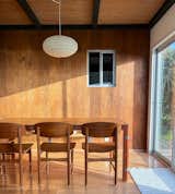 Dining area with vintage 60s teak dining table and Børge Mogensen chairs and Noguchi lantern define this cozy seating for 4-6