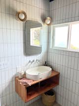 Fully updated bathroom with floor-to-ceiling Cle tiles, Concreti sink, custome vanity Ghostown woodworks