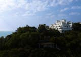 Exterior and Beach House Building Type  Photo 1 of 19 in Miyue · Blue & White Cliffside Resort