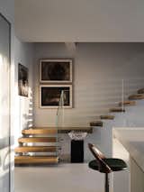 Staircase, Wood Tread, and Glass Railing  Photo 2 of 36 in Lakeside Villa by ACE Design by DW
