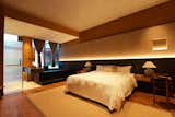 Bedroom, Bed, Night Stands, and Recessed Lighting  Photo 18 of 19 in Mu Feng Yue Hot Spring Hotel by Studio A+ by DW