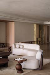 Amalgamation of materials such as brass, wood, soft surfaces essaying modern minimalism.