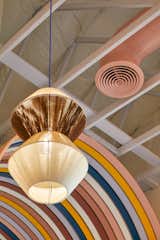 Custom light fixtures were designed in-house and handwoven in Greece.