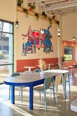 A colorful and eclectic mural on the wall is by one of Voyager’s baristas/artists, Julian de la Cruz.  Photo 17 of 20 in Voyager Craft Coffee aka “The Coop” by Studio BANAA