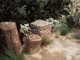 A chunk of Ubatuba granite was one of the first things Molly placed in the front garden, which runs along North Figueroa Street’s four lanes of traffic.