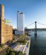 Located at the Domino Sugar Factory site along the Williamsburg waterfront, One Domino Square is a 39-story mixed-use condominium tower designed by celebrated New York architecture firm Selldorf Architects.
