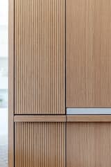 Reeded details on built in coffee/cocktail bar