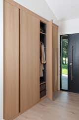 No shortage of space with reeded white oak detailing and custom storage within