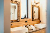 Industrial accents run throughout the home, including bathroom.