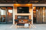 Sunroom with sliding doors into home.