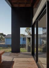 Windows, Sliding Window Type, and Metal Charcoal cladding providing a distinct contrast  Photo 24 of 29 in A Family’s Seaside Cottage Renovation Makes Room for New Memories from The Marlo Summer House