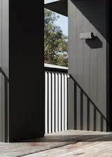 The vertical galvanized steel balustrades 