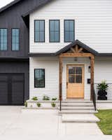 Black and white exterior with wood door