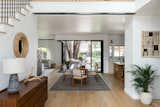 Open entry with console table, dining area, looking out to the backyard.