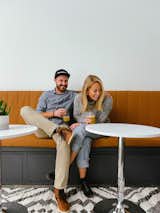 Husband and wife creative duo, RC & Molly Walker.  Having an honorary cheers on opening day. 