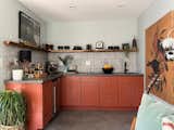 Kitchenette accented with tile by Kelly Wearstler.