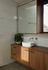 Ensuite bathroom with spotted gum cabinetry