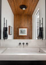 Bath Room, Concrete Counter, Medium Hardwood Floor, Vessel Sink, and Ceiling Lighting  Photo 15 of 21 in barhaus by HK Architects