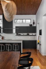 Kitchen, Wood Cabinet, Ceiling Lighting, and Medium Hardwood Floor  Photo 17 of 21 in barhaus by HK Architects