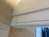 (Rotate image 90 deg counter clockwise) detail of flush-casing openings with opening and base set flush to gyp board using 1/4 x 5/8" cove molding.