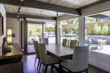 Dining area.  All windows replaced with insulated glass and concealed roller-shades.  VIews out through windows to newly remodeled garden and patio areas.