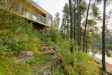 Exterior, Metal Roof Material, Metal Siding Material, Cabin Building Type, and Flat RoofLine view from sun deck  Photo 4 of 11 in White Pine Retreat by Fletcher Noonan