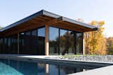 Exterior, Flat RoofLine, Wood Siding Material, and House Building Type Pool shot   Photo 18 of 20 in Hudson Woods Pool House by Matt Kowalewski