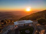 Outdoor, Trees, Front Yard, Grass, Back Yard, and Shrubs Sunset views from the home   Photo 1 of 15 in Modern Home Atop Palomar Mountain by Matt Kowalewski