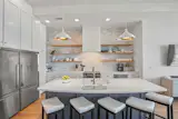 Fully-stocked kitchen with new appliances 
