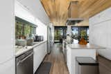 Fully-stocked kitchen with modern appliances 