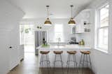 Open living to kitchen and natural light with bright colors help make the space feel bigger than the actual size.