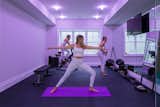 
The gym, in particular, was programmed to display bright orange and red colors to stimulate energy and promote movement during a workout, and soft blues and purples to create calm and reduce heart rate for cool-downs or meditation sessions. 