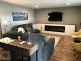 Living Area with built in electric fireplace and custom photography (self)