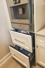 Butler's pantry with built in Gaggeneau coffee machine with coffee cup warmer, Subzero fridge drawer, dishwasher and wine cooler 