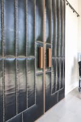 Leather doors that were repurposed from original 1930's home