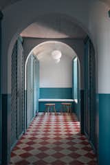 Hallway and Porcelain Tile Floor Hallway  Photo 6 of 12 in Pools and water rooms by Glassenstump Creations from From Roman Ruin To Family Home